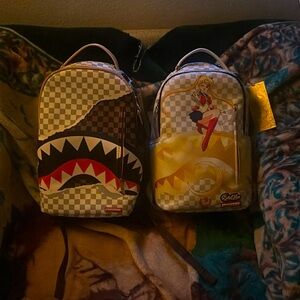 2 spray ground backpacks selling 100 each